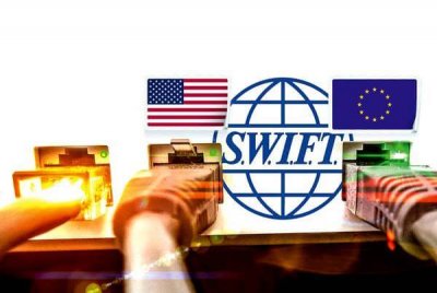 Россия может быть отключена от банковской платежной системы SWIFT
